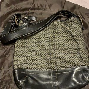 Black & gray shoulder coach bag.
